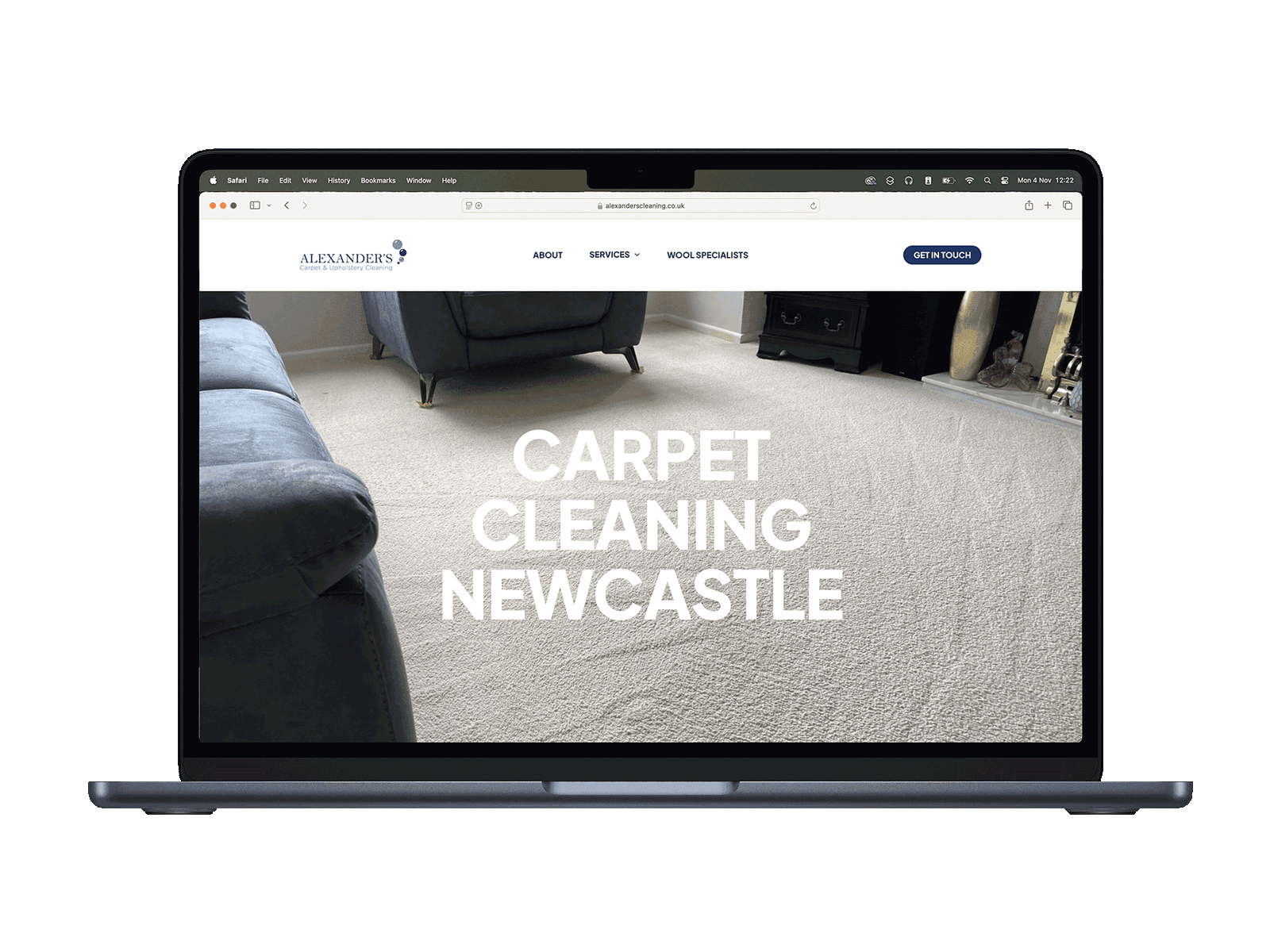 Carpet cleaning service in Newcastle on laptop screen.