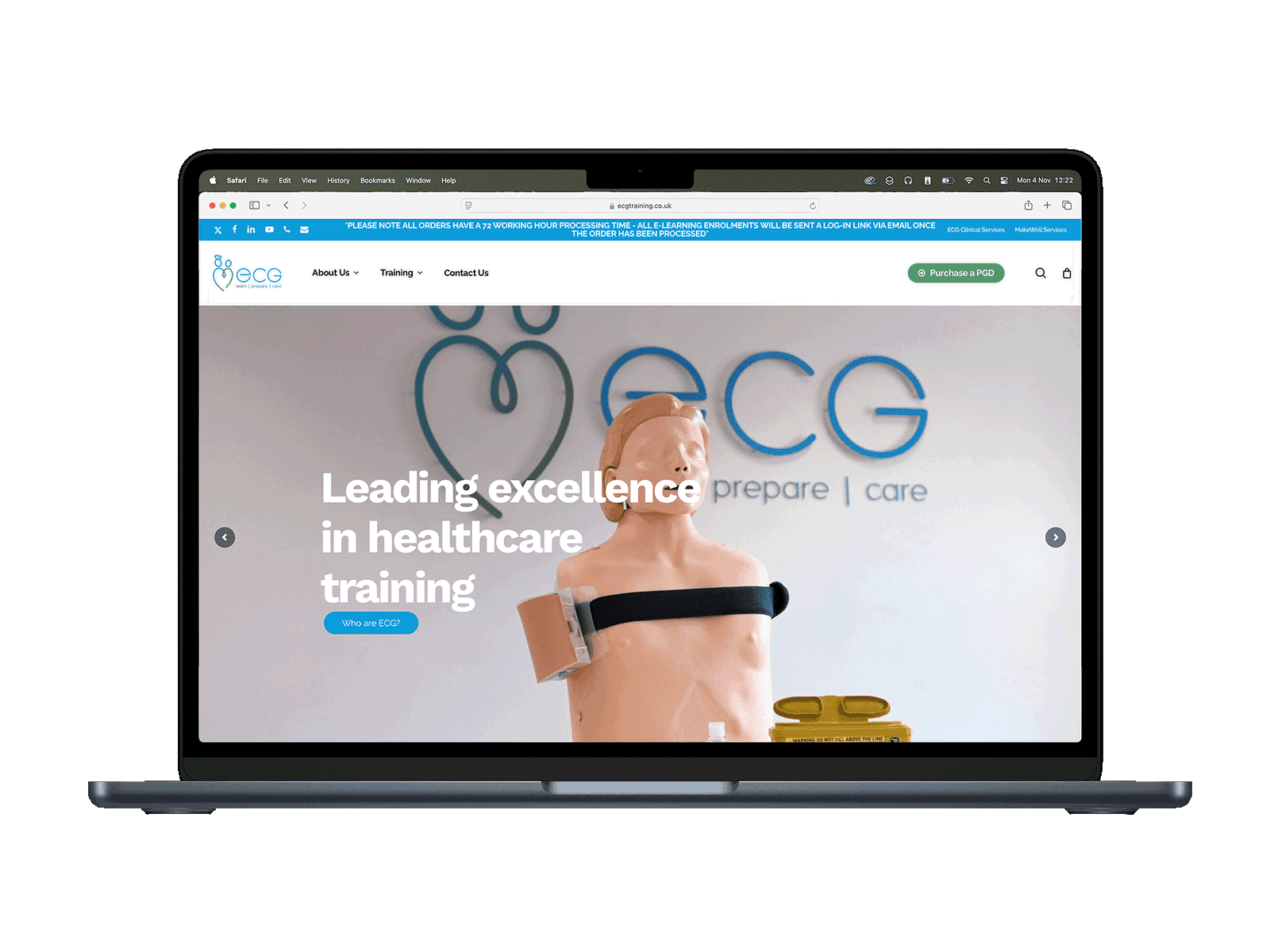 Laptop displaying healthcare training website homepage.