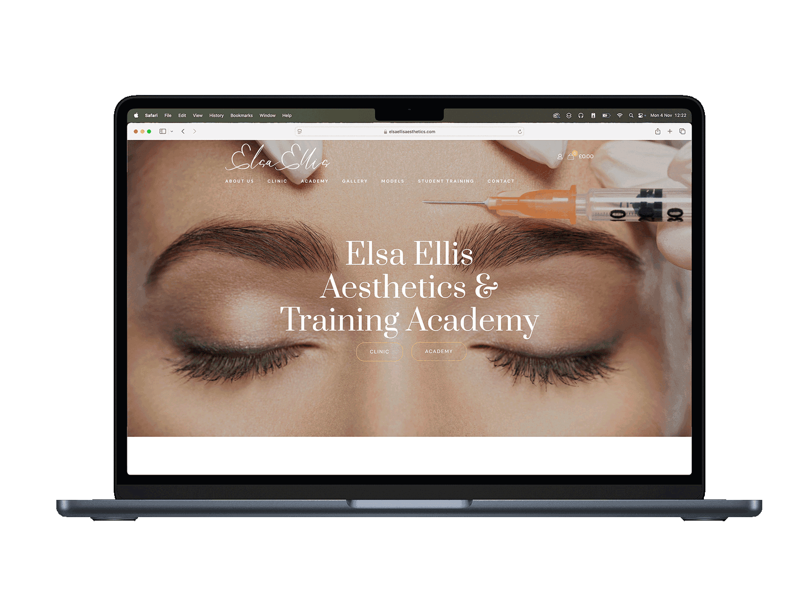 Laptop displaying aesthetics training website homepage.
